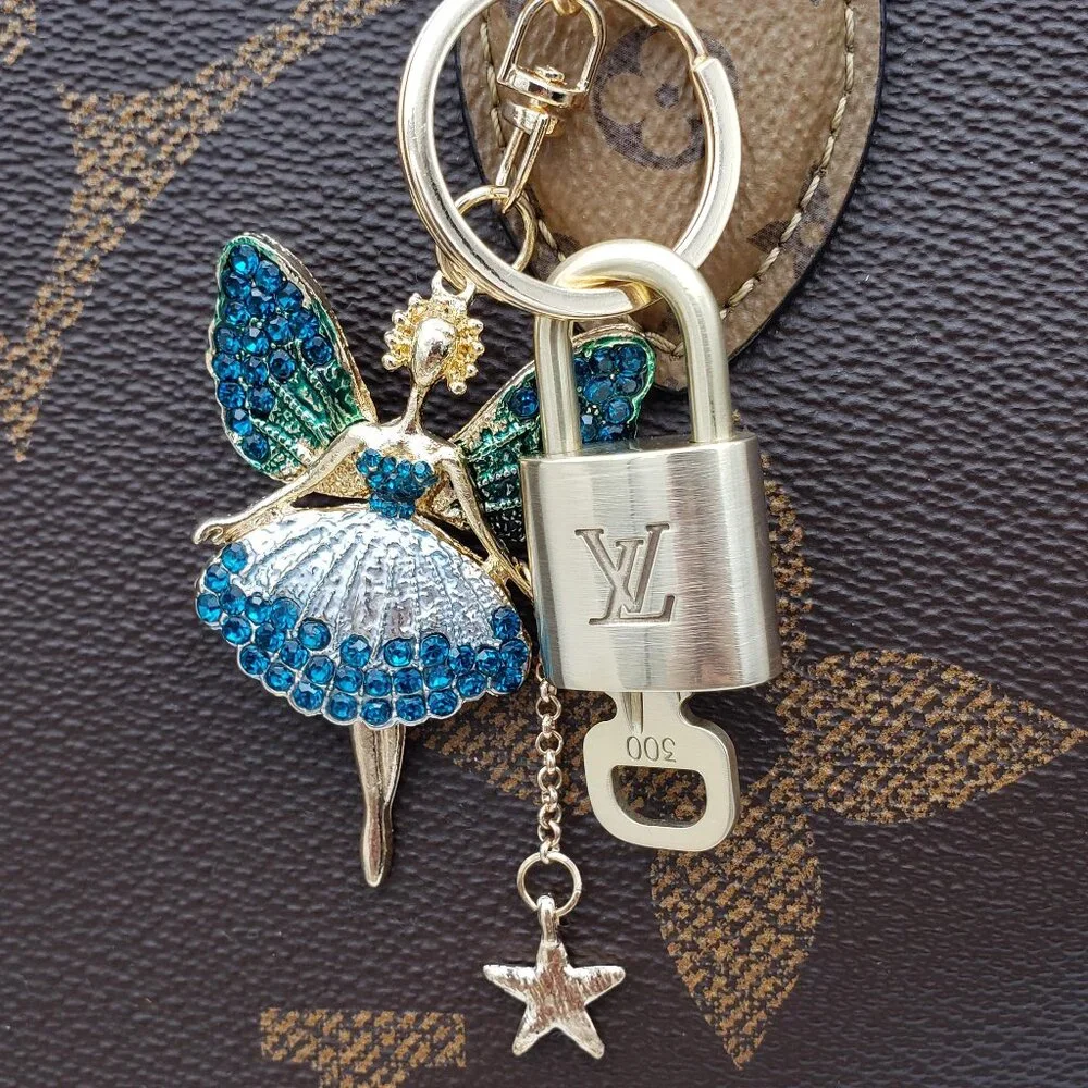Authentic Louis Vuitton Lock & Key with Unbranded Fairy Charm, Keychain